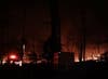 A fire burns at Joint Base McGuire-Dix-Lakehurst on Wednesday night. Authorities said it was contained Thursday morning.